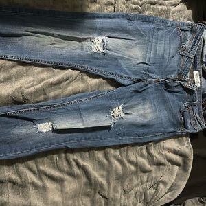 Almost famous midrise distressed skinny jeans